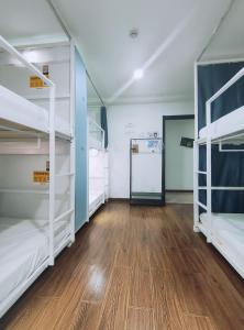 Postel nebo postele na pokoji v ubytování Onederz Hostel Hangzhou + 32 fotografií