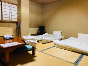 Postel nebo postele na pokoji v ubytování Hotel Tae Windsor + 37 fotografií