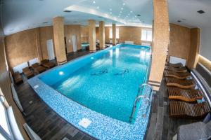 Bazén v ubytování Apartmani Elixir nebo v jeho okolí