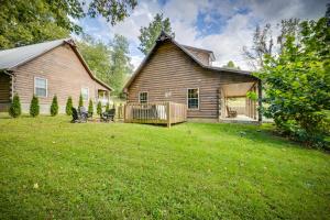 a home with a yard with a house at Paws in the Air in Pigeon Forge