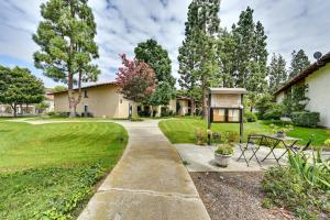 a walkway through a yard with a gazebo at San Diego Condo Pool Access, 8 Mi to Downtown in San Diego