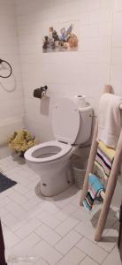 a bathroom with a white toilet in a room at Guest house Le petit jardin Marrakech in Marrakesh +45 photos