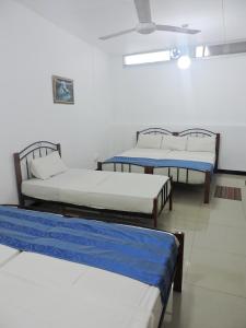Letto o letti in una camera di Charlton Kandy City Rest