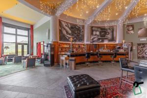 Posezení v ubytování HOTIDAY Room Collection - Sauze Torre