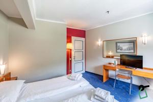 Postel nebo postele na pokoji v ubytování HOTIDAY Room Collection - Sauze Torre