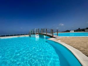 Bazén v ubytování Studio Epoustouflant Vue Mer St Martin nebo v jeho okolí