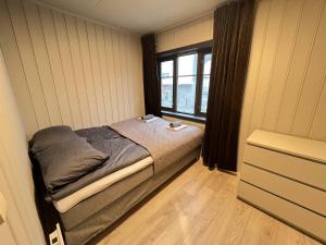 Postel nebo postele na pokoji v ubytování Apartment in Tromsø Mainstreet