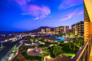 a view of a city at night at Memory Maker Copala Corner Unit Ocean View in Cabo San Lucas