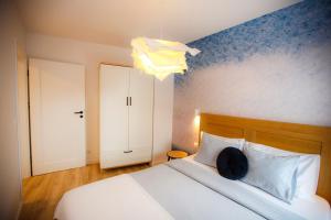 Posteľ alebo postele v izbe v ubytovaní Bochenka Apartments II
