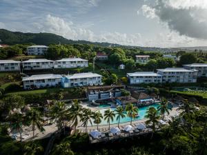 an aerial view of a resort with a swimming pool at Studio GAP in Le Diamant