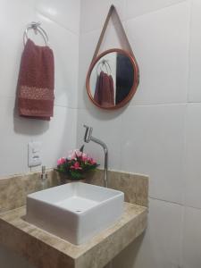 Ванная комната в Dunas residence casa 15- Lençois Maranhense
