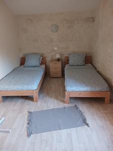 Postel nebo postele na pokoji v ubytování La Huppe