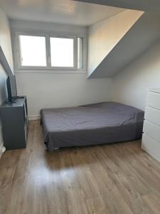 Kuvagallerian kuva majoituspaikasta Studio vue tour Eiffel 10' Paris, joka sijaitsee kohteessa Puteaux