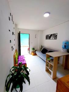 Postel nebo postele na pokoji v ubytování OSIMiRI PLAZA Apartamento Naturaleza y aventura