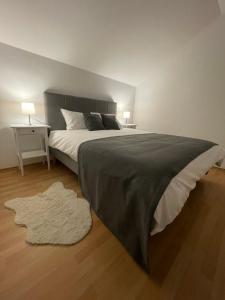 Postel nebo postele na pokoji v ubytování Apartman Magnolia