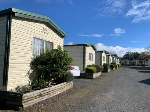a row of houses on a street at Prom Central Caravan Park in Foster