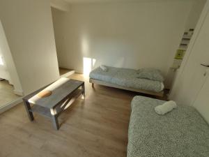 Fotografia z galérie ubytovania T2 bis Confort avec 5 couchages individuels et parking privé v destinácii Villeurbanne