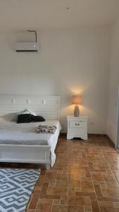 Cama ou camas em um quarto em Casa Paz