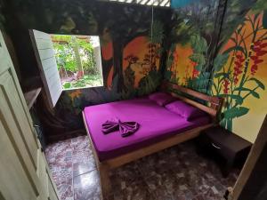 Postel nebo postele na pokoji v ubytování Oasis Beachfront Hostel
