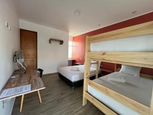 Dviaukštė lova arba lovos apgyvendinimo įstaigoje La Estancia Hotel Ica