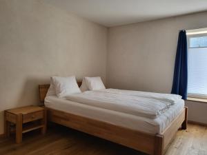 Postel nebo postele na pokoji v ubytování Kapitel 7 Boutique-Hotel