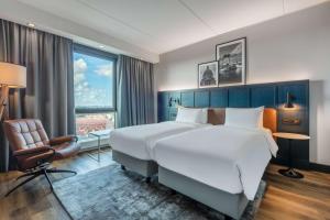 Katil atau katil-katil dalam bilik di Radisson Blu Scandinavia Hotel, Copenhagen
