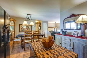 a kitchen and dining room with a table and a dining room at Red Lodge Mountain Home Less Than 7 Miles to Ski Slopes! in Red Lodge
