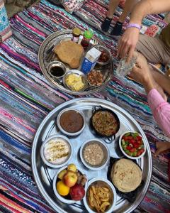 a table with a tray of food on it at Princess carine in Luxor