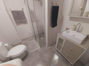 Ванная комната в Grande Apartamento Central