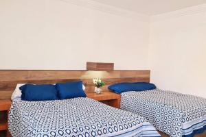 Postel nebo postele na pokoji v ubytování Alojamiento completo en el centro
