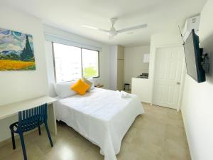 Postel nebo postele na pokoji v ubytování Magico Apartaestudio con Piscina 1 Habitacion PR56A