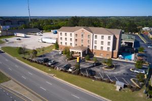 an aerial view of a building with a parking lot at Comfort Inn & Suites Augusta West Near Fort Eisenhower in Augusta