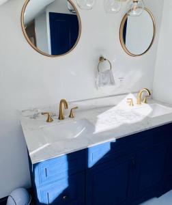 A bathroom at Host your group - West End Sea Captain Home