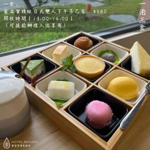 a tray filled with different types of desserts at 蜜滋賀溫泉飯店 in Ruisui