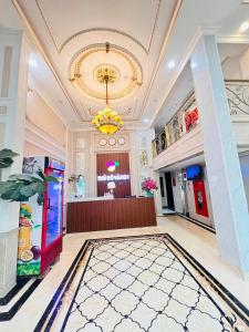 a lobby of a hotel with a red vending machine at Thủ Đô Vàng Hotel - QL6 Hà Đông - by Bay Luxury in Hà Ðông