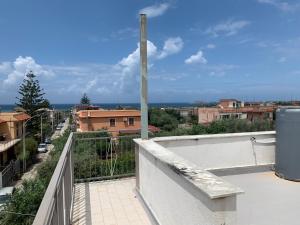 En balkon eller terrasse på Villetta Spina