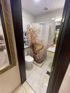 Koupelna v ubytování Lovely rental studio in Sharjah near to beach