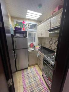 Kuchyň nebo kuchyňský kout v ubytování Lovely rental studio in Sharjah near to beach