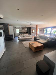 Posteľ alebo postele v izbe v ubytovaní Maison en bois , plein pieds,piscine privative