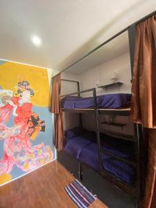 Postel nebo postele na pokoji v ubytování Pai circus hostel