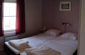 Postel nebo postele na pokoji v ubytování Peaceful nature retreat