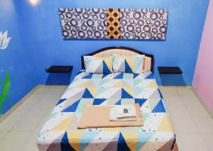 Ένα ή περισσότερα κρεβάτια σε δωμάτιο στο Azifa inn solo near RS JIH Solo