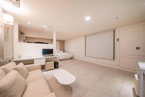 TV a/nebo společenská místnost v ubytování HOTEL STAY AYANA DAEJEON