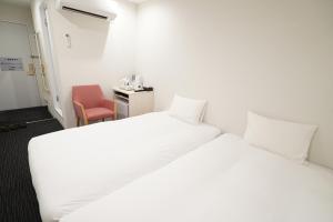 Voodi või voodid majutusasutuse CVS Bay Hotel New Building toas