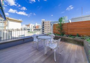 Balkón nebo terasa v ubytování Saka no Hotel Tretio Ochanomizu
