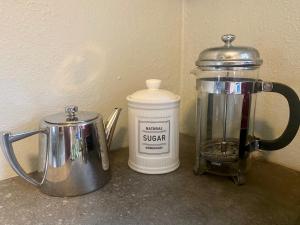 a blender and a coffee maker on a counter at Oranuisce Thatch Cottage Ballyvaughan in Ballyvaughan