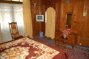 Ліжко або ліжка в номері House boat New Chez Henry