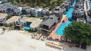 an aerial view of a resort on the beach at Yotaka Khanom in Ban Phang Phrao