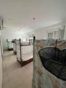 Ein Bett oder Betten in einem Zimmer der Unterkunft Hostel A2C