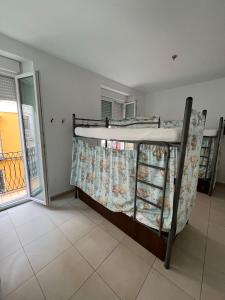 Ein Bett oder Betten in einem Zimmer der Unterkunft Hostel A2C